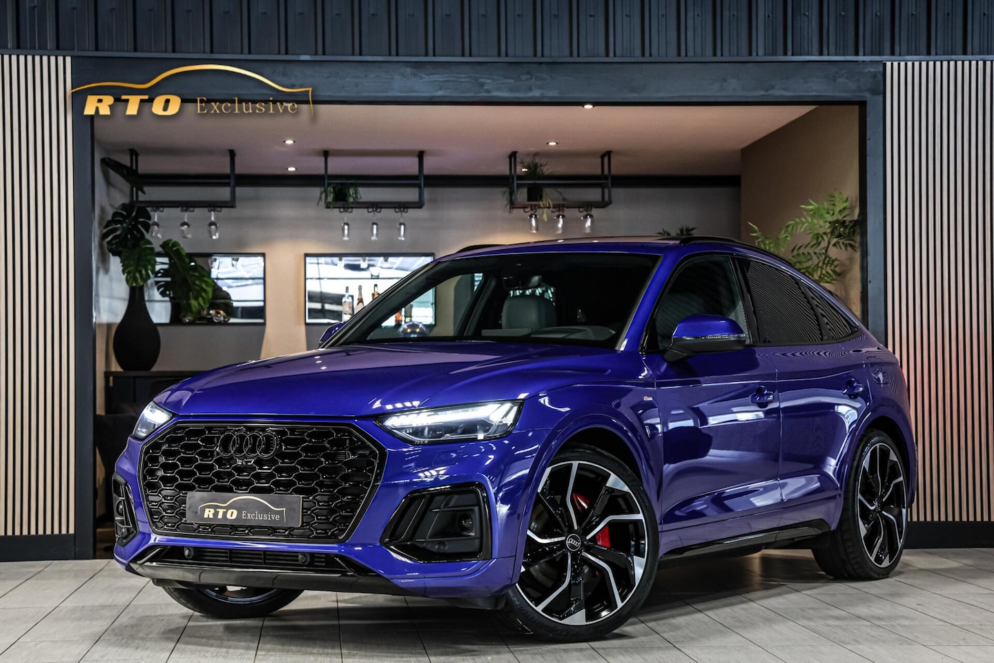 Audi Q5 - 50 TFSIe|Ultrablau|S-line|black|carbon|22''|pano|leder - AutoWereld.nl