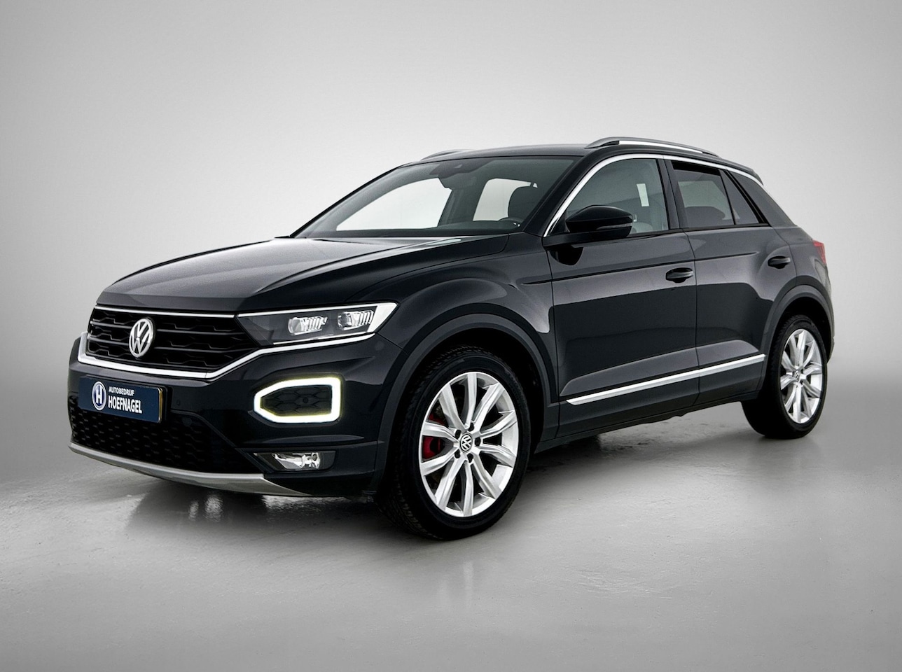 Volkswagen T-Roc - 1.5 TSI Sport | Camera | Stoel-/Stuurverwarming | Electrische Kofferklep - AutoWereld.nl