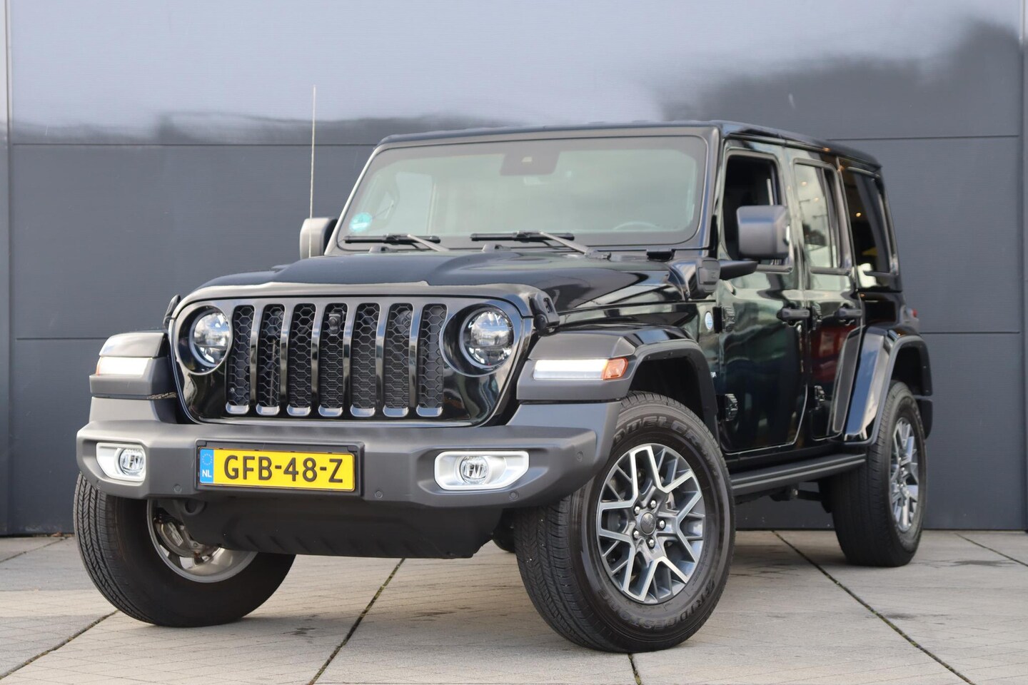 Jeep Wrangler Unlimited - 4xe 380 Sahara / Leder / Navi / Keyless - AutoWereld.nl