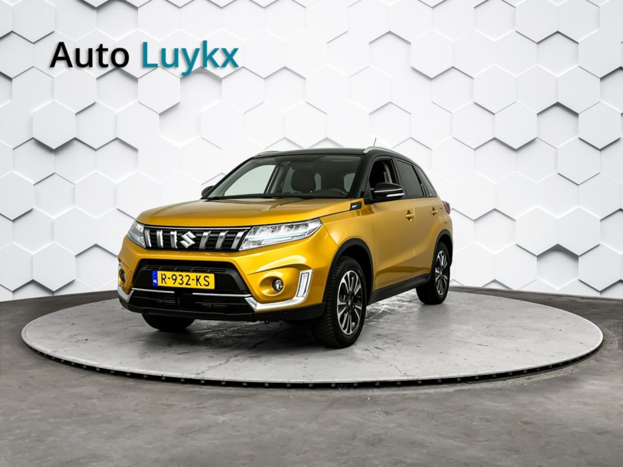 Suzuki Vitara - 1.4 Boosterjet Style Smart Hybrid Automaat | Trekhaak | Allseason Banden | Leder/Alcantara - AutoWereld.nl