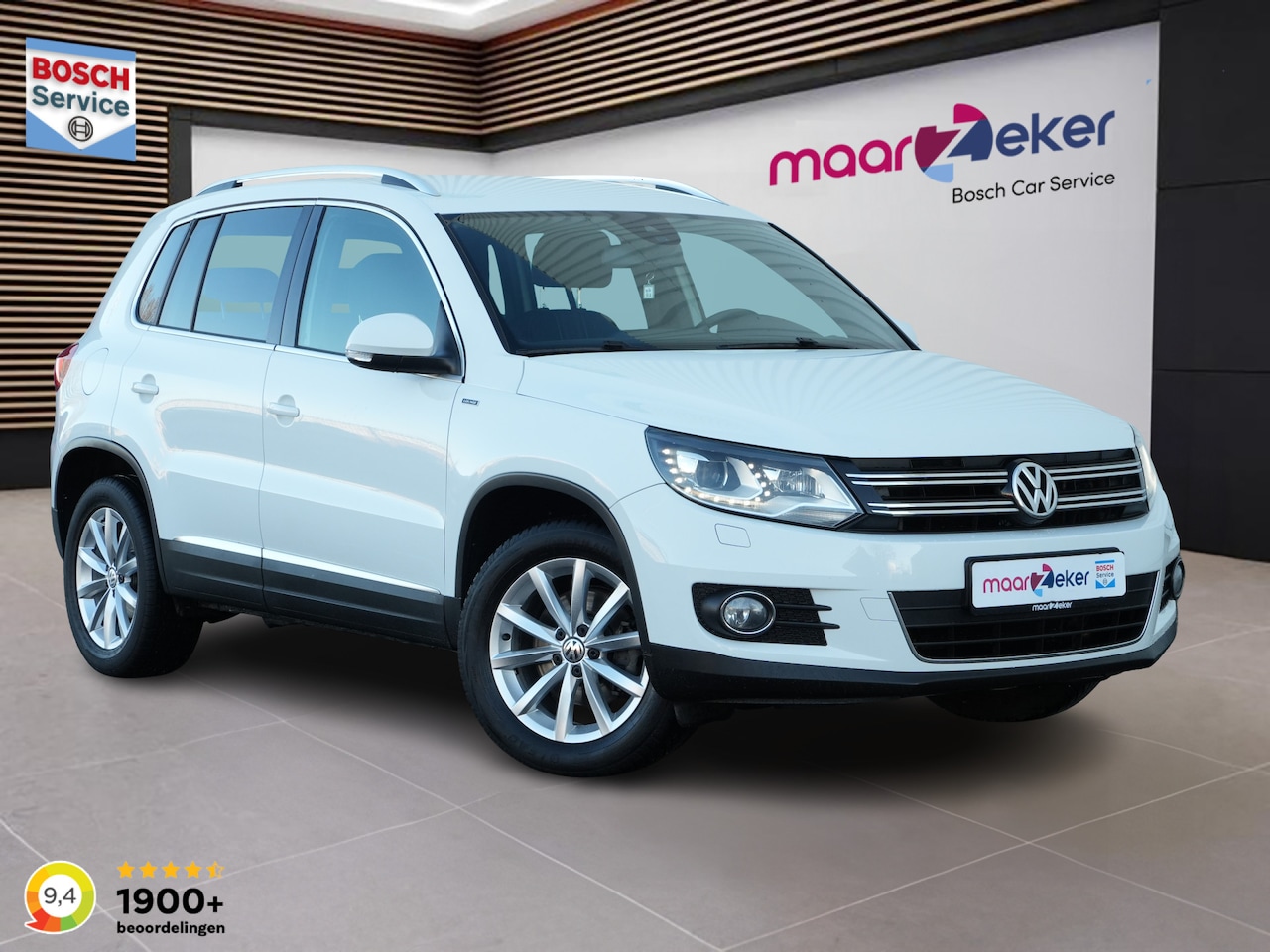 Volkswagen Tiguan - 1.4 TSI Sport&Style ✅Stoelverw.✅Navi✅Camera✅Clima✅Cruise✅ - AutoWereld.nl