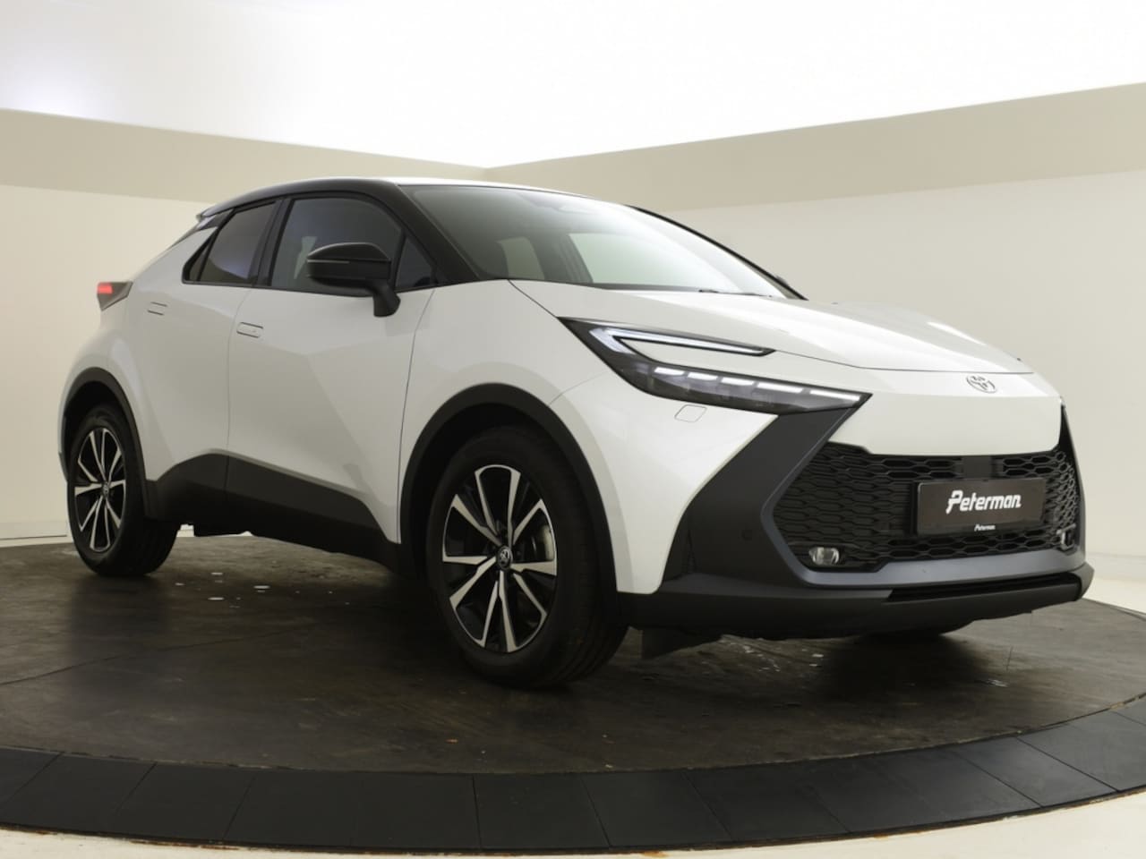 Toyota C-HR - 1.8 Hybrid 140 Style Bi Tone | Elektrische A. Klep | Blindspot - AutoWereld.nl