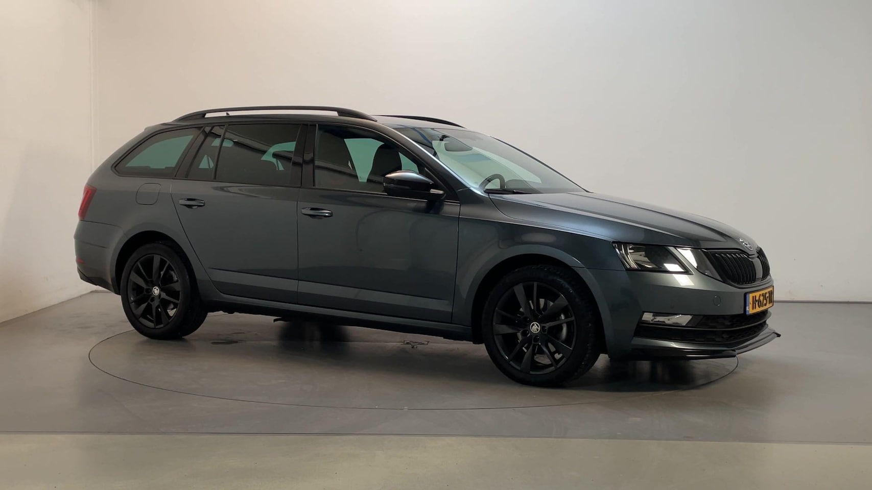 Skoda Octavia Combi - 1.0 TSI Greentech Sport Business Navigatie Parkeersensoren Climate Control - AutoWereld.nl