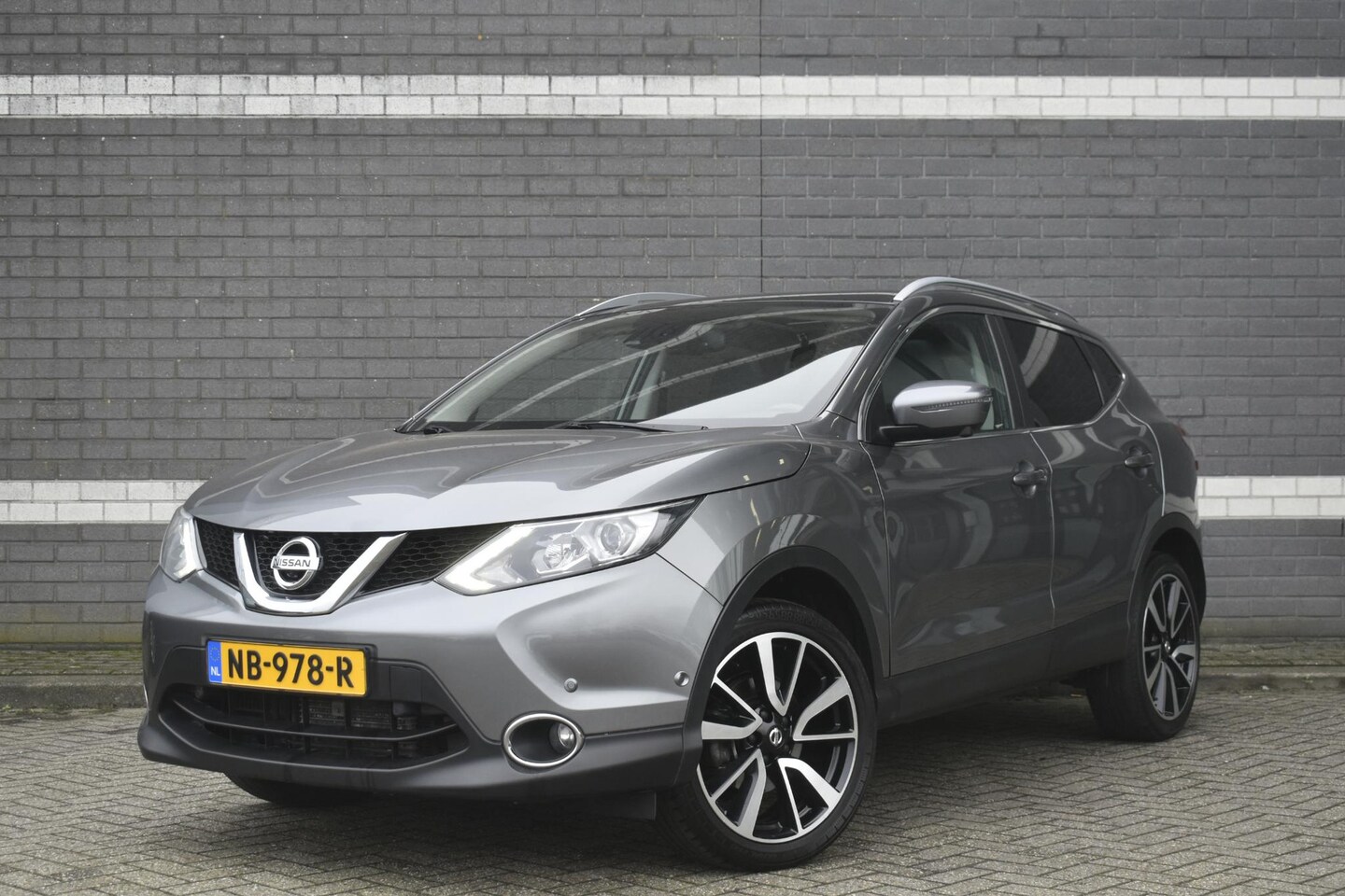 Nissan Qashqai - 1.2 Tekna / Pano / Leder / Navi / Camera / Stoelverwarming - AutoWereld.nl