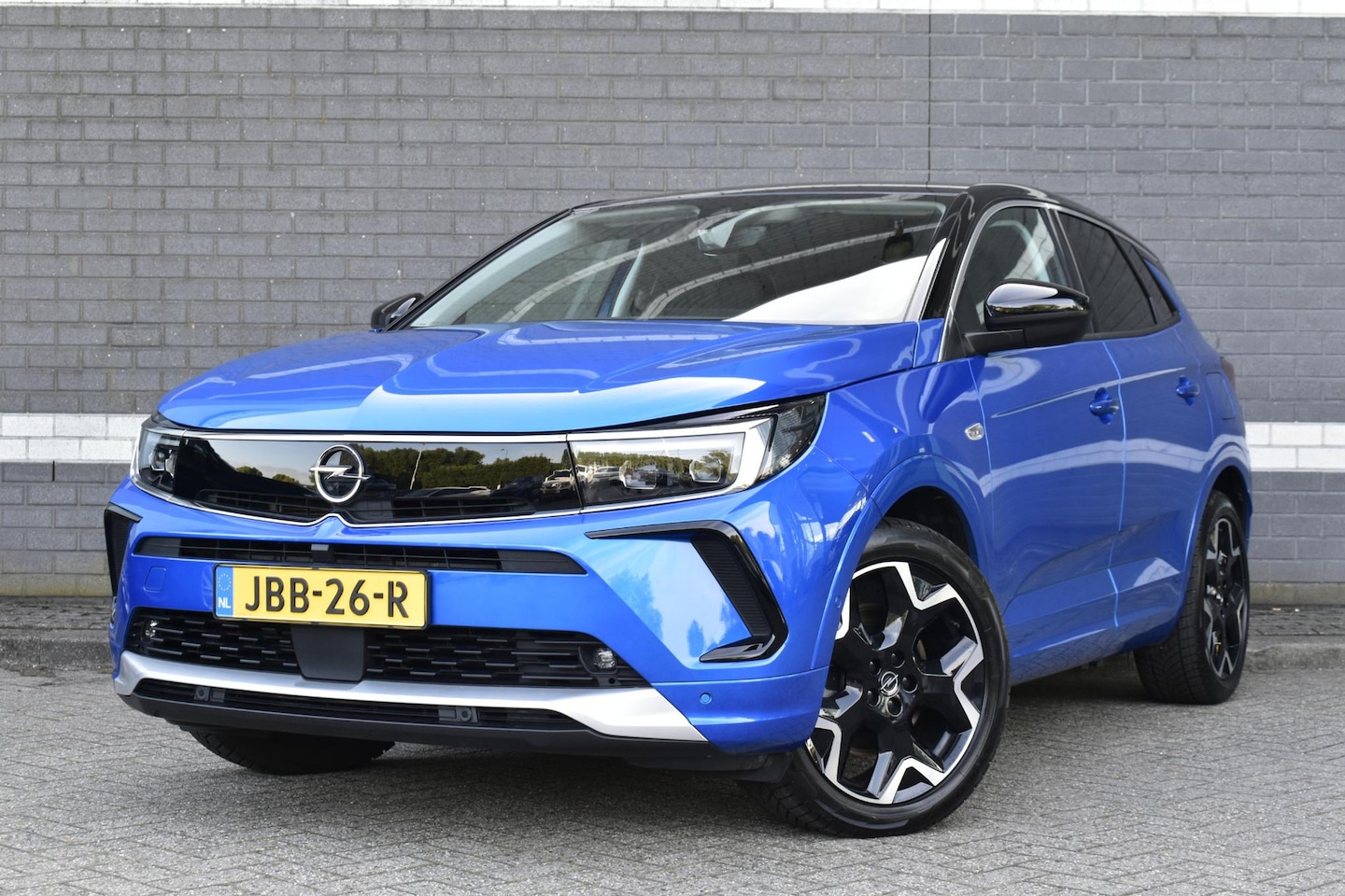 Opel Grandland - 1.6 Turbo Plug-In Hybrid Business Elegance / Stoel + Stuurverwarming / Alcantara / Keyless - AutoWereld.nl
