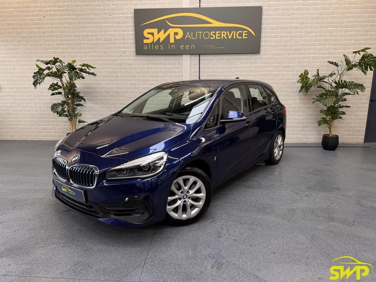 BMW 2-serie Active Tourer - 225xe iPerformance Executive | Sportline | HUD | ACC | Fullmap groot navi | Camera | Spieg - AutoWereld.nl