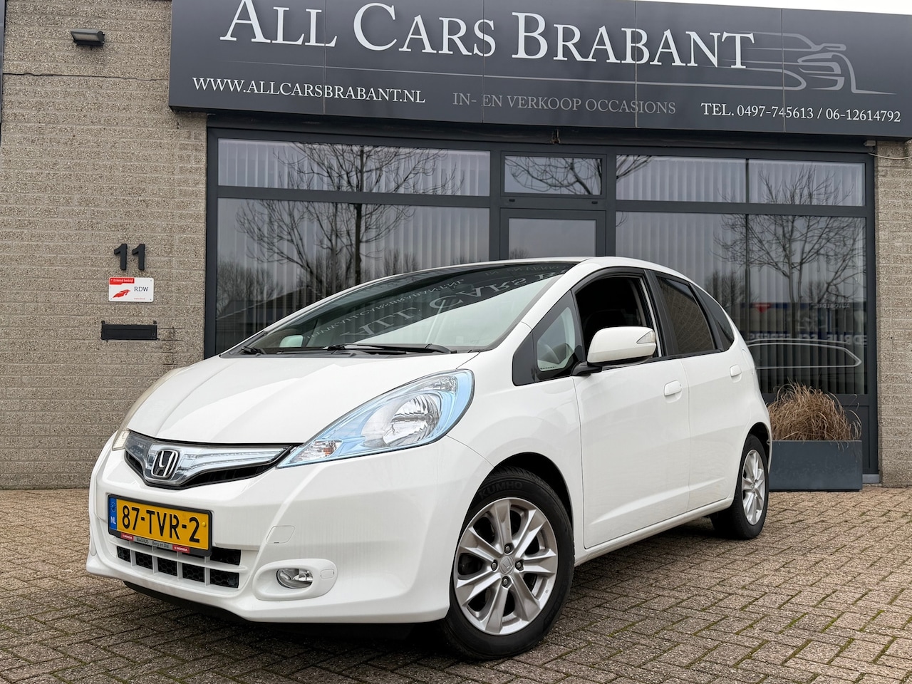 Honda Jazz - 1.4 Hybrid Business Mode + / navi / automaat - AutoWereld.nl