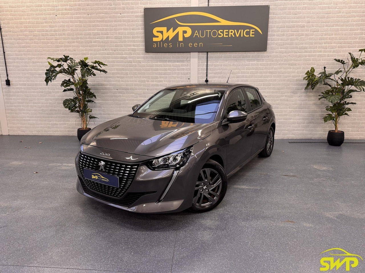 Peugeot 208 - 1.2 PureTech Active Pack | Navi | Automaat | Metallic grijs - AutoWereld.nl