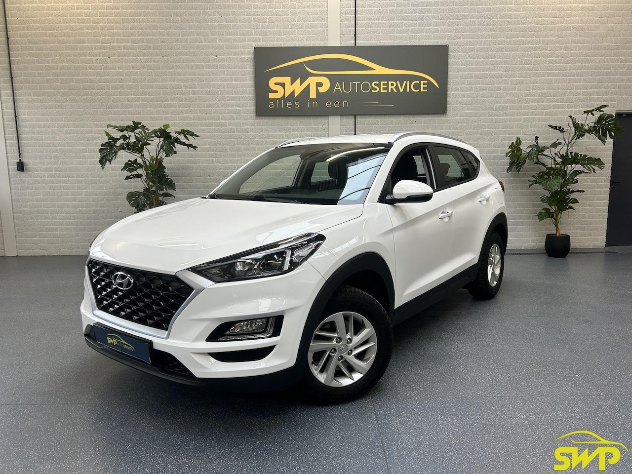 Hyundai Tucson - 1.6 GDI Comfort | Facelift | Trekhaak | Navi via Carplay | Camera | Climate - AutoWereld.nl