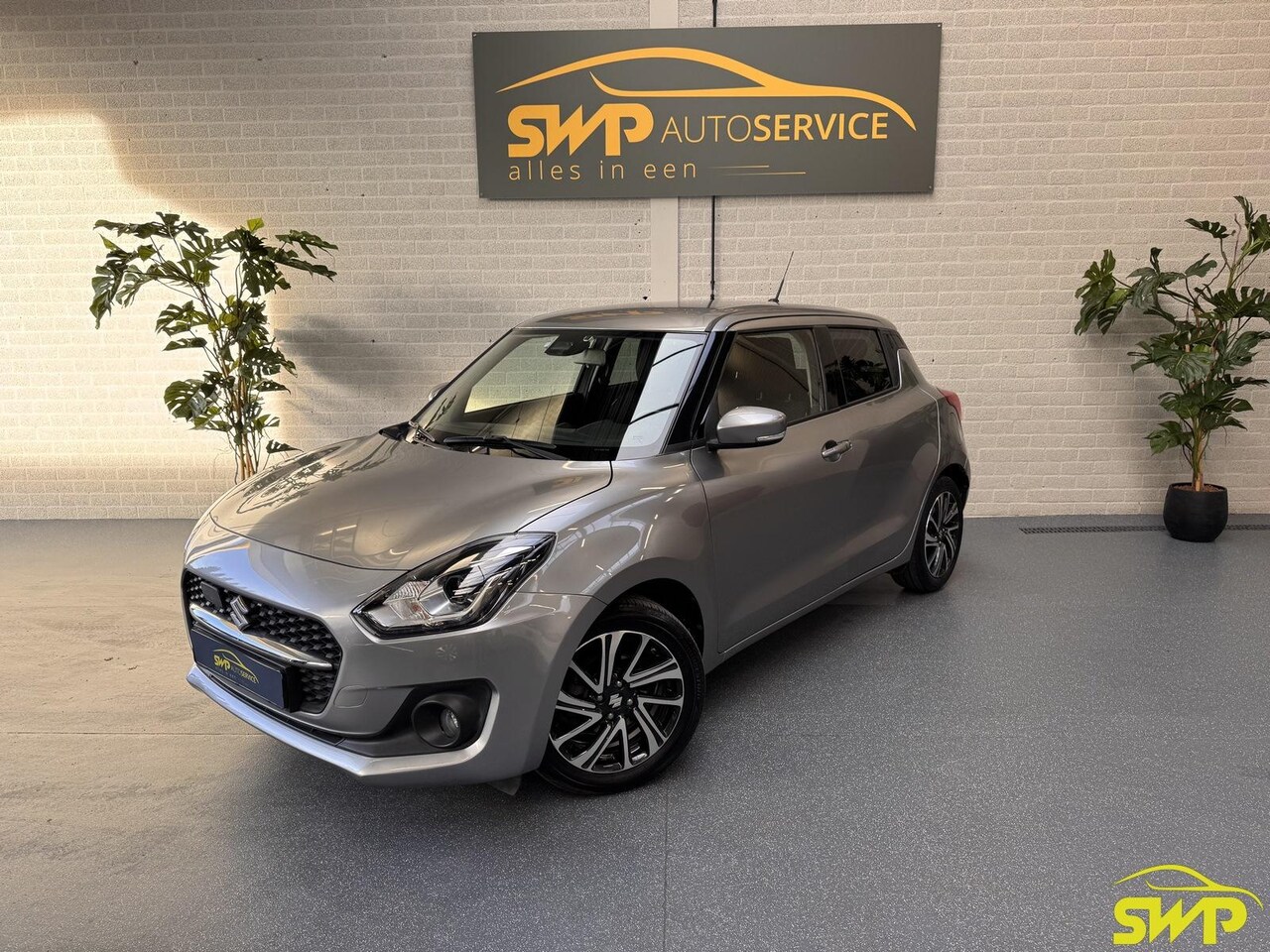 Suzuki Swift - 1.2 Style Smart Hybrid | Navi | Camera | Climate | Luxe velgen | ACC | Lage kms - AutoWereld.nl