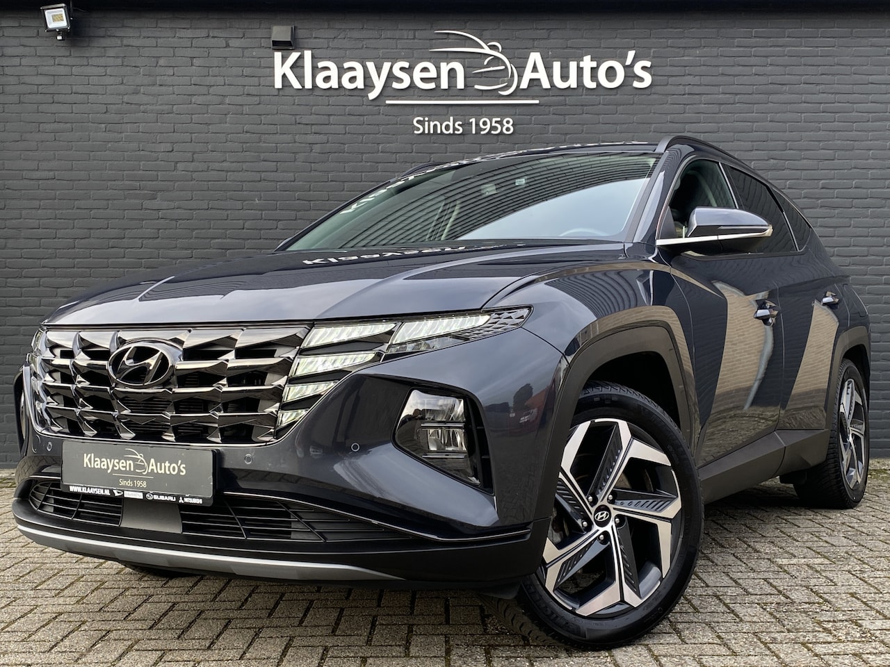 Hyundai Tucson - 1.6 T-GDI PHEV Comfort Smart 265 pk 4WD AUT. | 1e eigenaar | dealer onderhouden | trekhaak - AutoWereld.nl