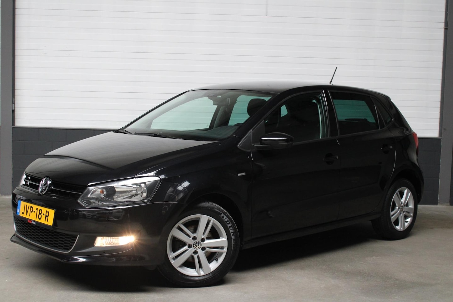 Volkswagen Polo - 1.2-12V Comfortline l Clima l Cruise l PDC - AutoWereld.nl