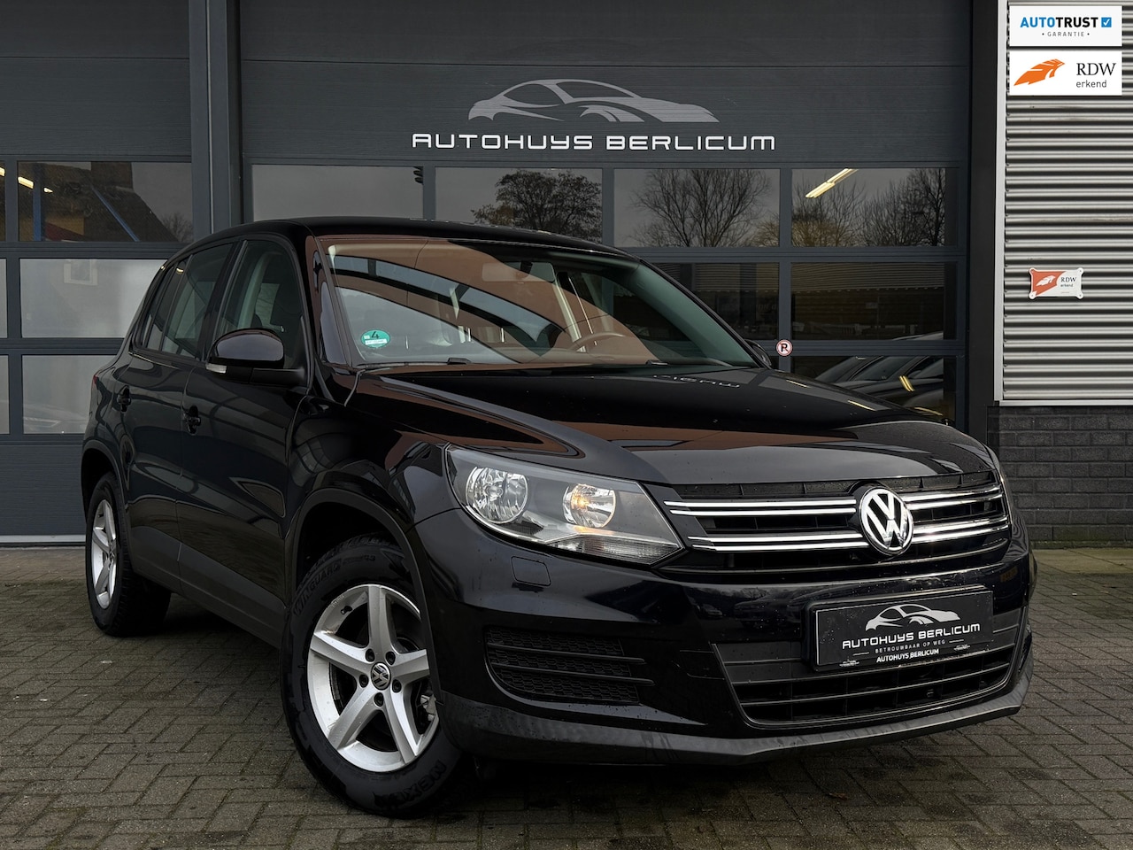Volkswagen Tiguan - 1.4 TSI Sport&Style Stoelverwarming Navi Cruise - AutoWereld.nl