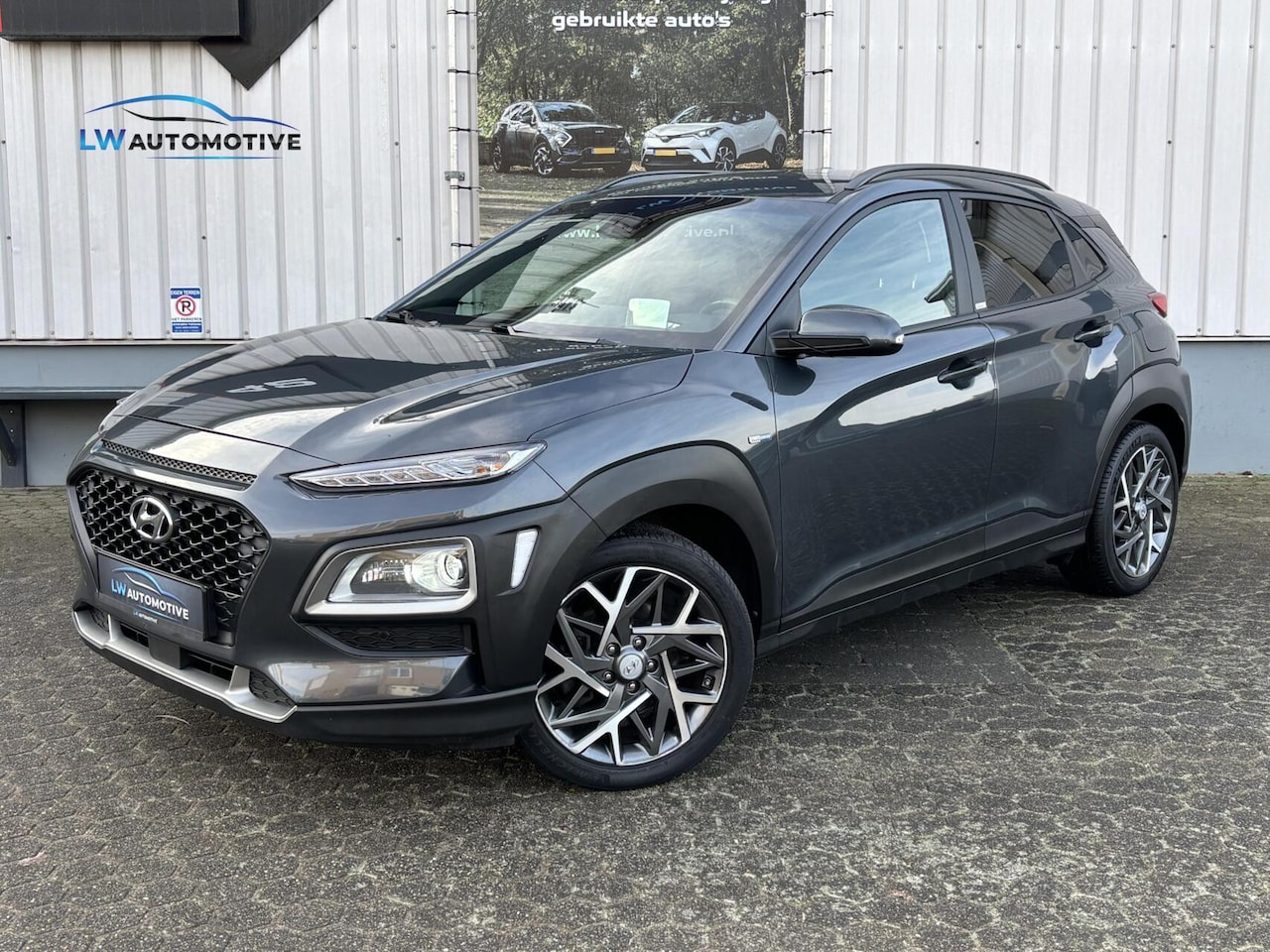 Hyundai Kona - 1.6 GDI HEV Fashion Design | HUD | KRELL | 18'' | Dodehoek | PDC v+a | Stoel+stuurverw. - AutoWereld.nl