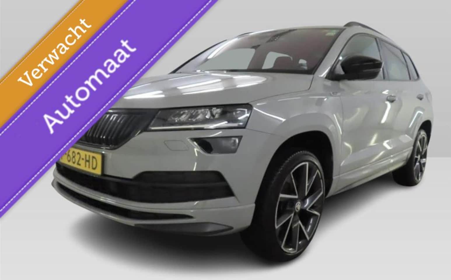Skoda Karoq - 1.5 TSI ACT Sportline Business | Stoelverwarming | - AutoWereld.nl