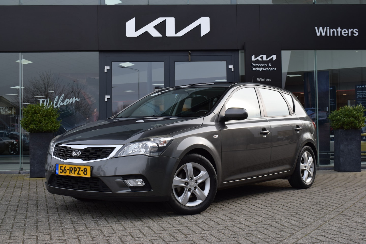 Kia Cee'd - 1.4 CVVT Seven | Camera | Cruise Control | Airco | Navigatie | Bluetooth | - AutoWereld.nl