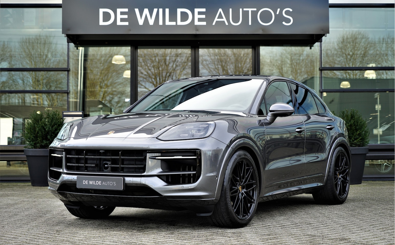 Porsche Cayenne Coupé - 3.0 E-Hybrid SportDesign Pano SoftClose Head-up Trekhaak Sportuitlaat Stoelventilatie - AutoWereld.nl