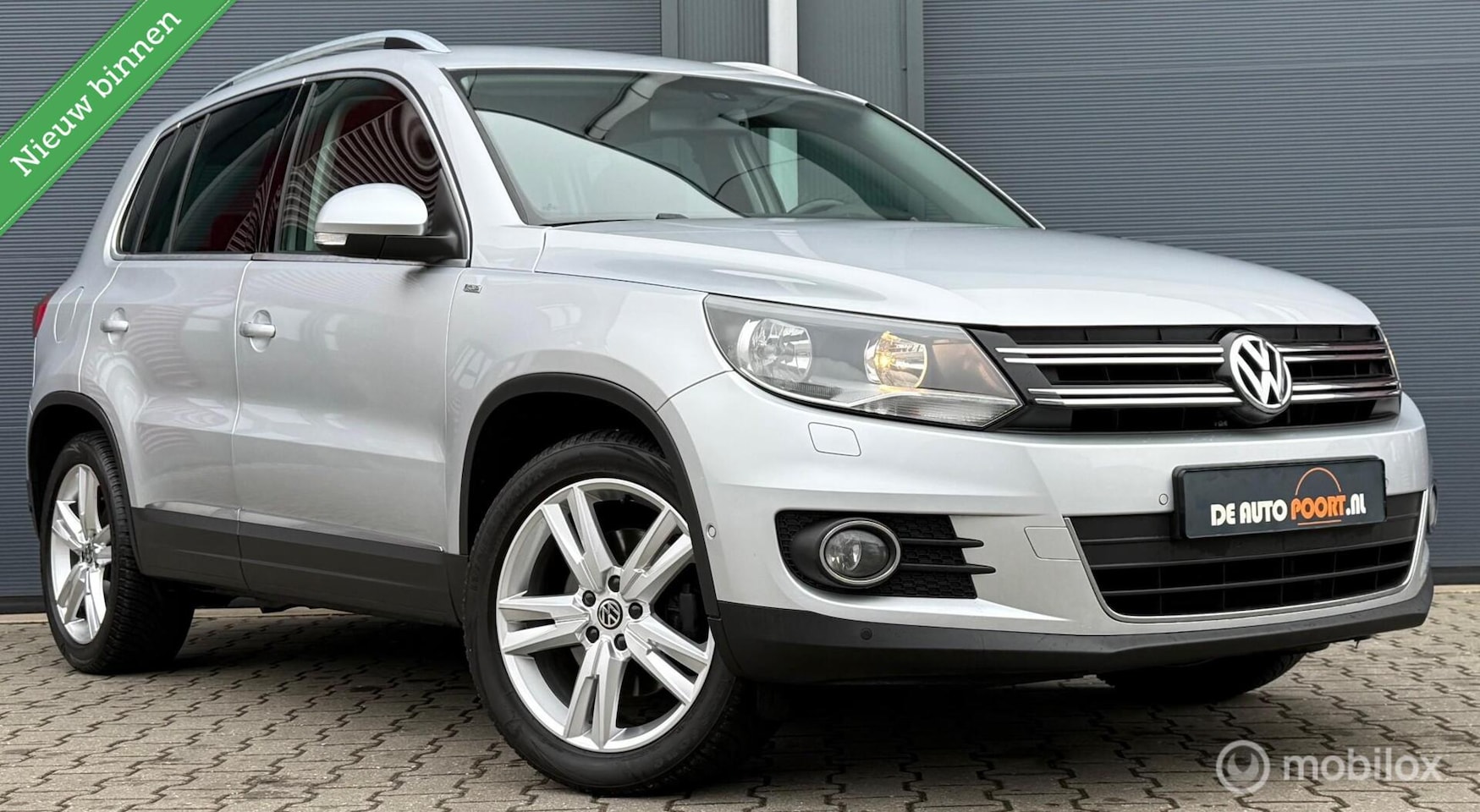 Volkswagen Tiguan - 1.4 TSI DSG CUP Trekhaak/Winterpack/Clima/18" - AutoWereld.nl
