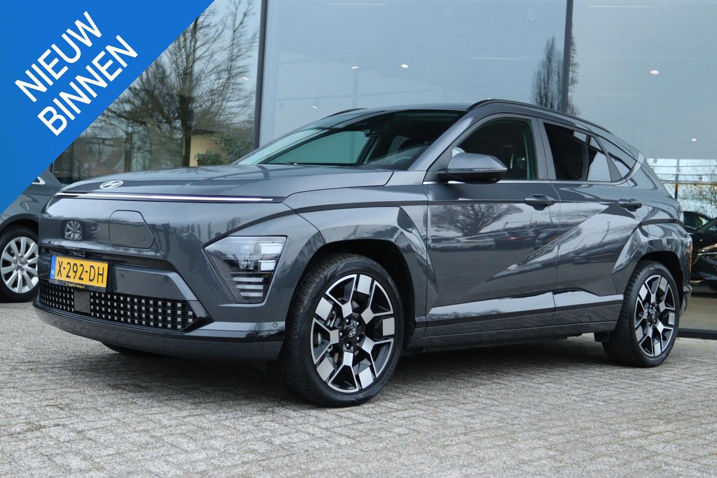 Hyundai Kona Electric - PREMIUM 65.4 kWh | LEDER | TREKHAAK | HUD | 360 CAMERA | MEMORY | ADAPTIVE CRUISE | STOEL- - AutoWereld.nl