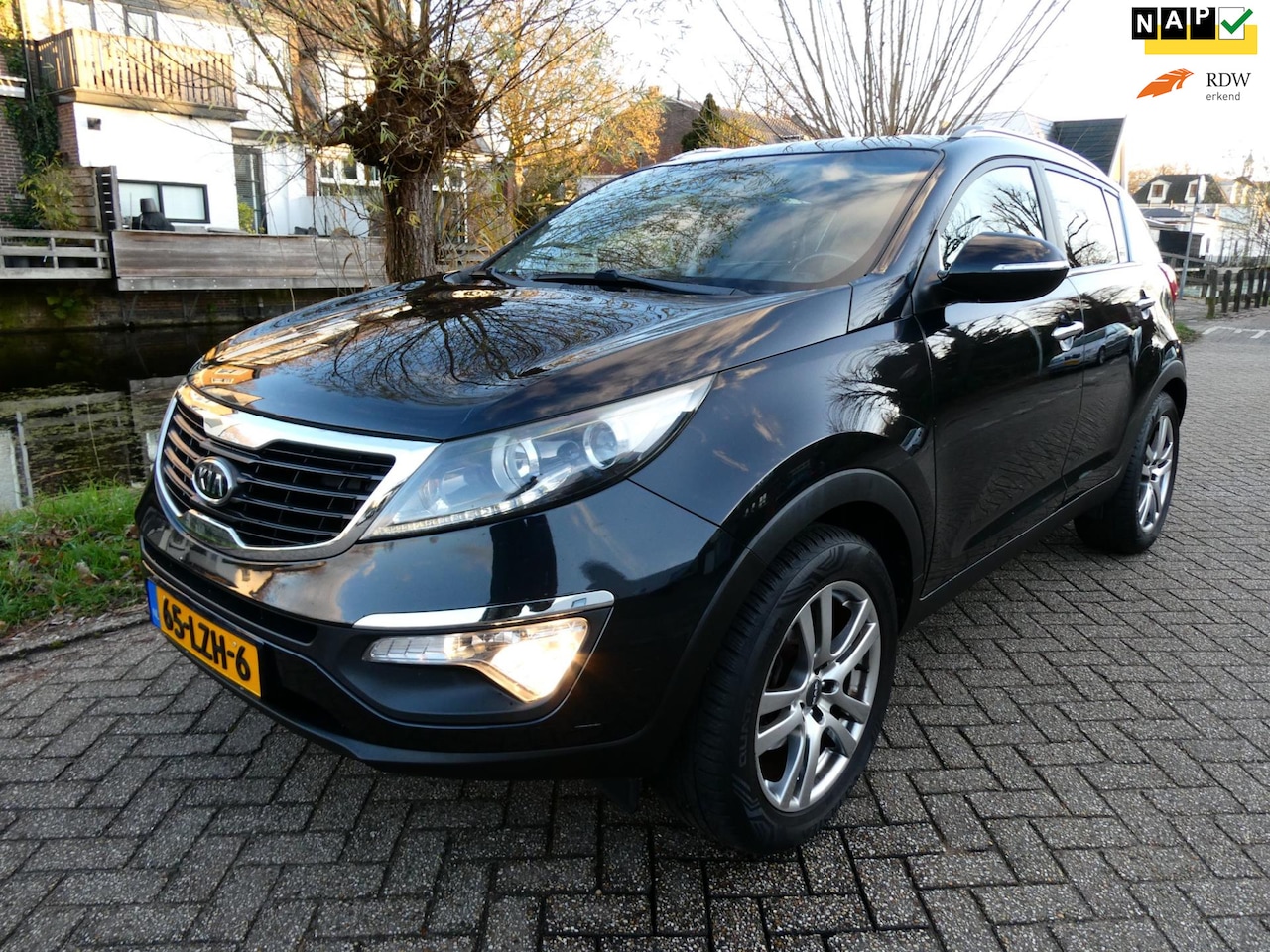 Kia Sportage - 2.0 X-ecutive Plus Pack 163pk Clima Cruise Trekhaak 1900kg. - AutoWereld.nl