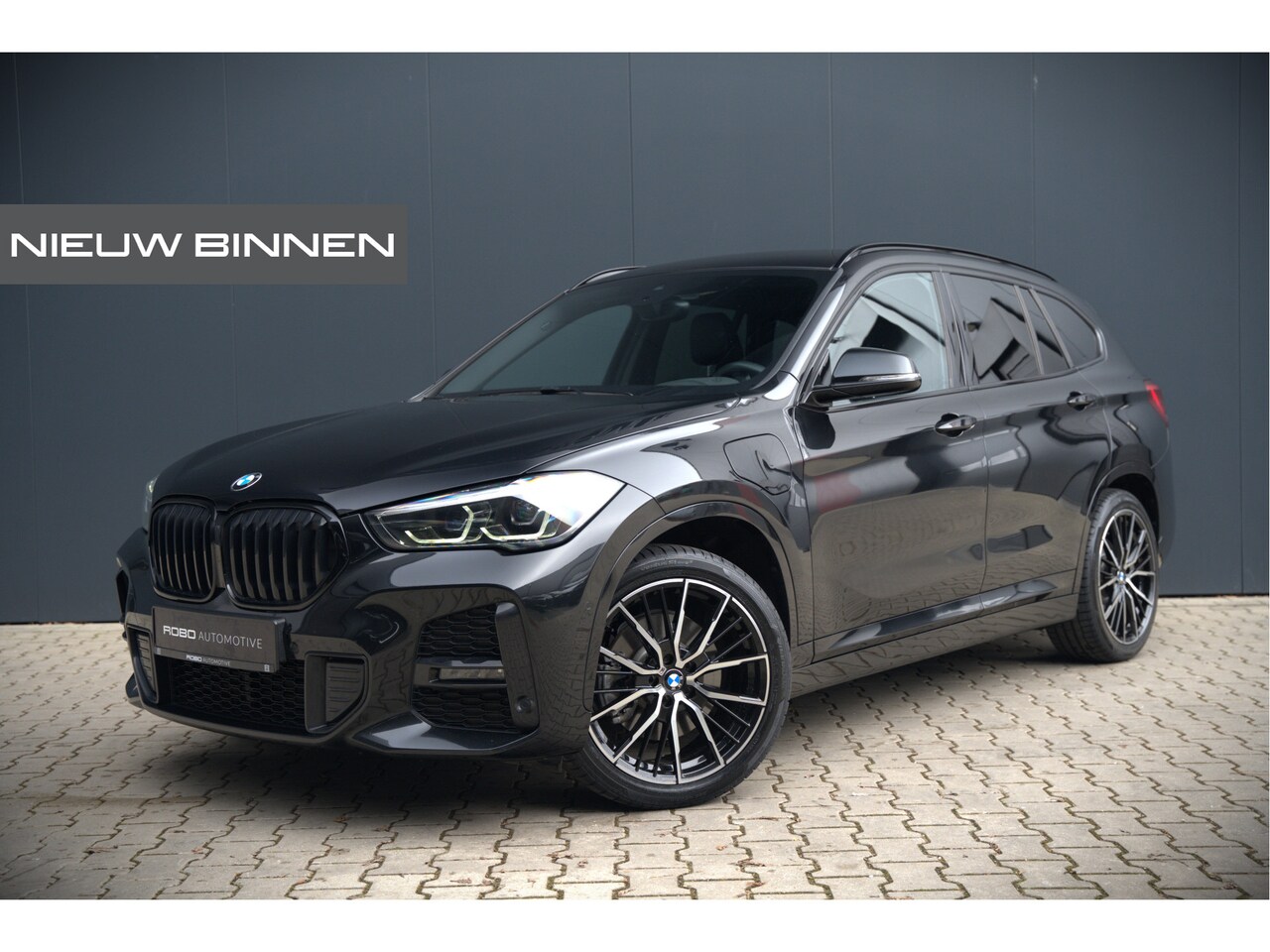 BMW X1 - xDrive25e Business Ed. Plus M Sport | Adaptive Cruise Control | Leer | Keyless | Camera | - AutoWereld.nl