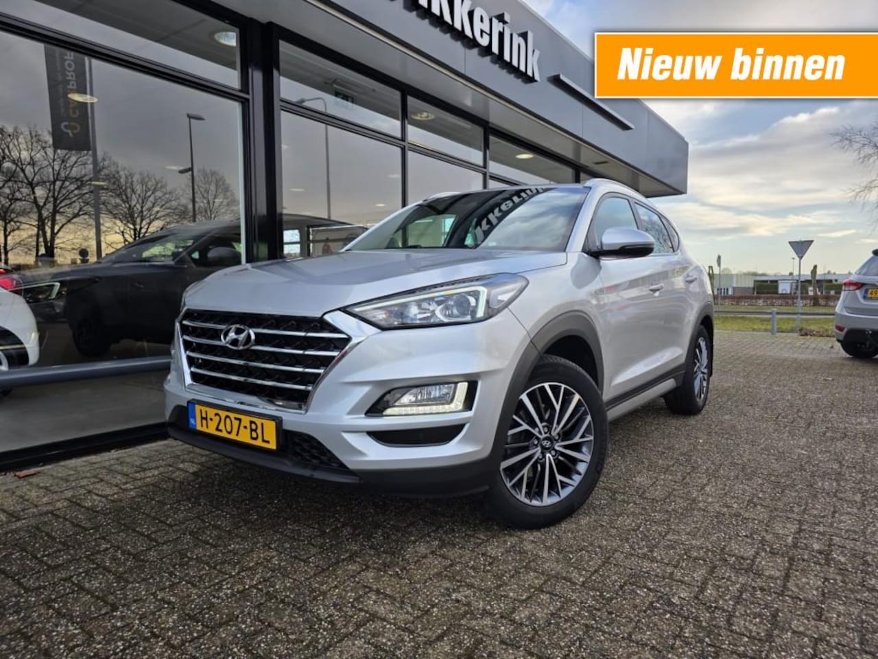 Hyundai Tucson - 1.6 GDI COMFORT NAVI/CLIMATE/18SPORTVELGEN/ TREKHAAK - AutoWereld.nl