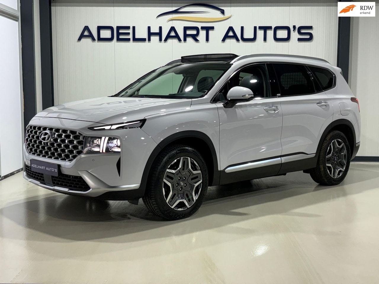 Hyundai Santa Fe - 1.6 T-GDI PHEV Premium Plus Sky / Panorama dak / Lederen interieur / Elektrische stoelen / - AutoWereld.nl