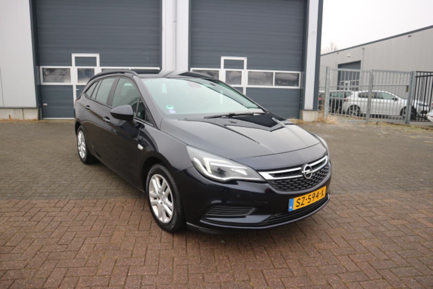 Opel Astra Sports Tourer - 1.4 Business+ 1e EIGENAAR - AutoWereld.nl