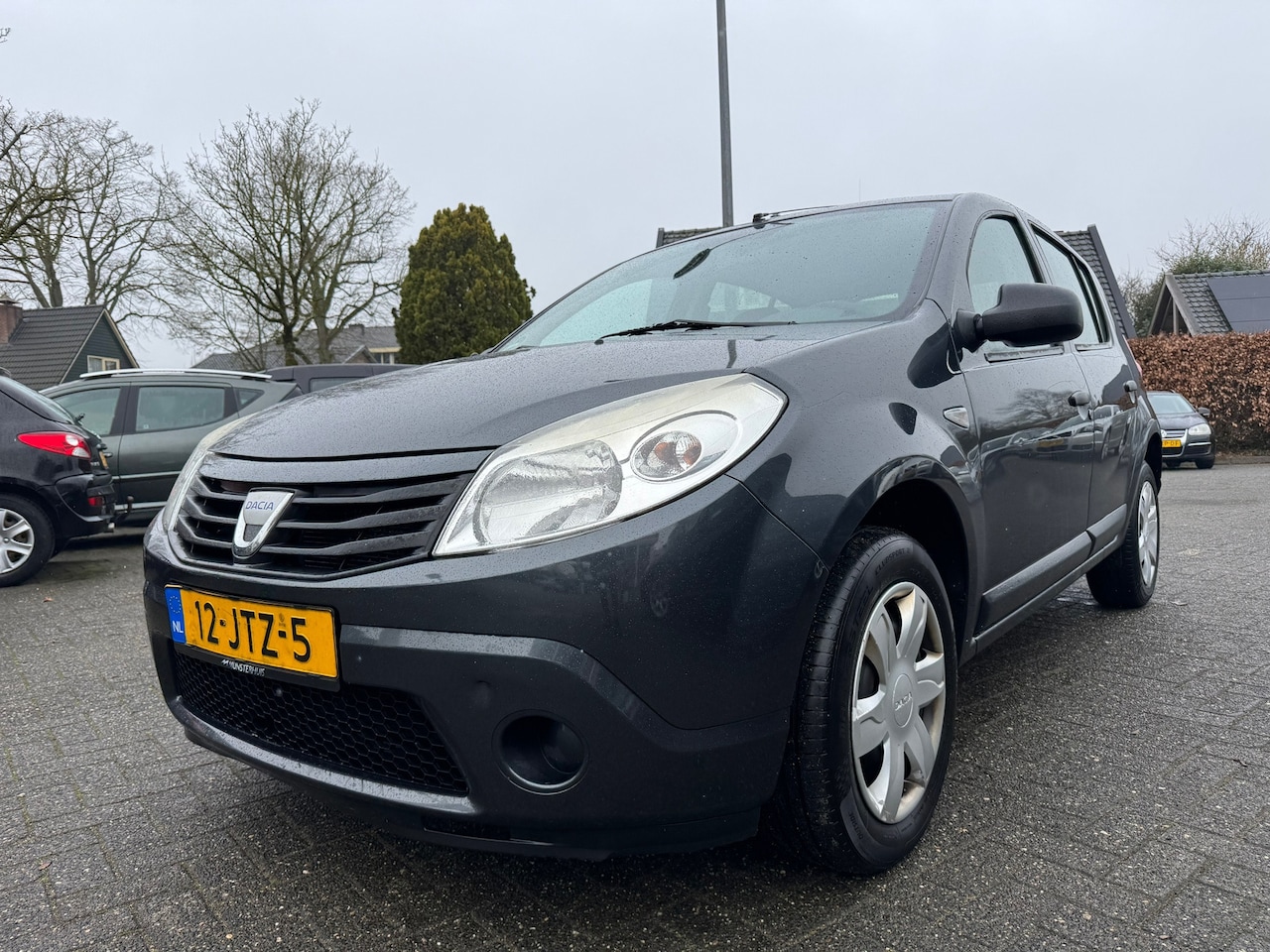 Dacia Sandero - 1.2 Ambiance 1.2 Ambiance 75pk,Apk 8/9/26,Airco,Nap - AutoWereld.nl