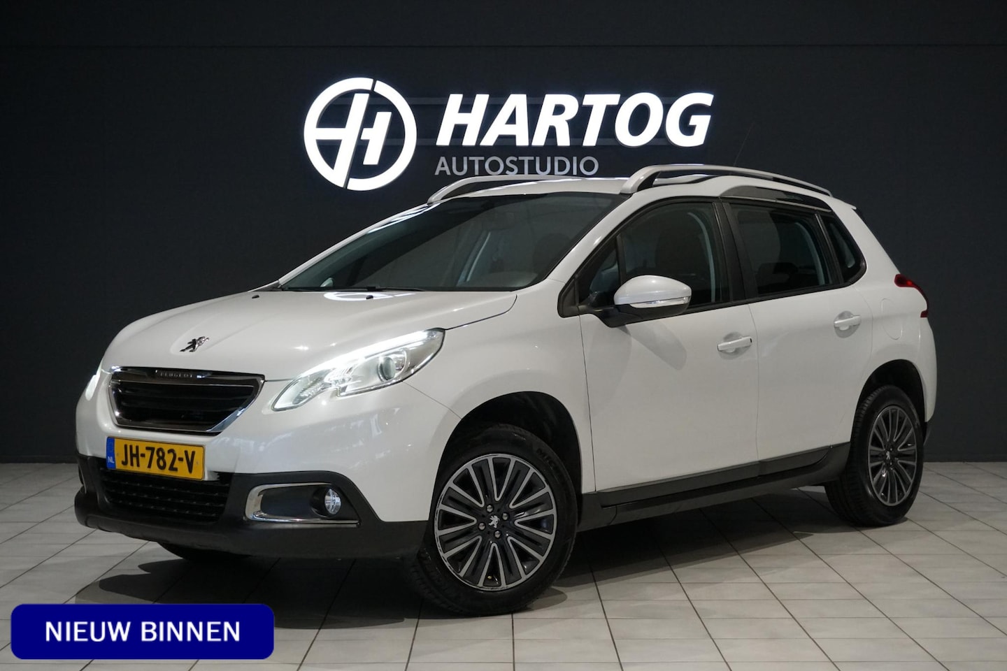 Peugeot 2008 - 1.2 PureTech Blue Lion * EERSTE EIGENAAR * + PAKEERSENSOREN / NAVIGATIE - AutoWereld.nl