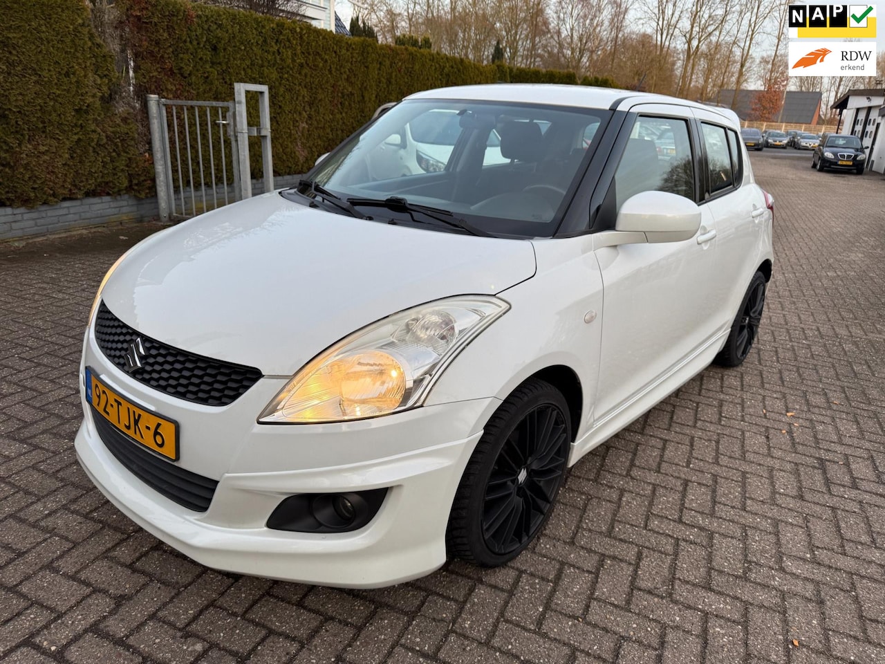 Suzuki Swift - 1.2 5DRS Comfort EASSS SPORT AC LMV NAVI 17" LMV NAP - AutoWereld.nl