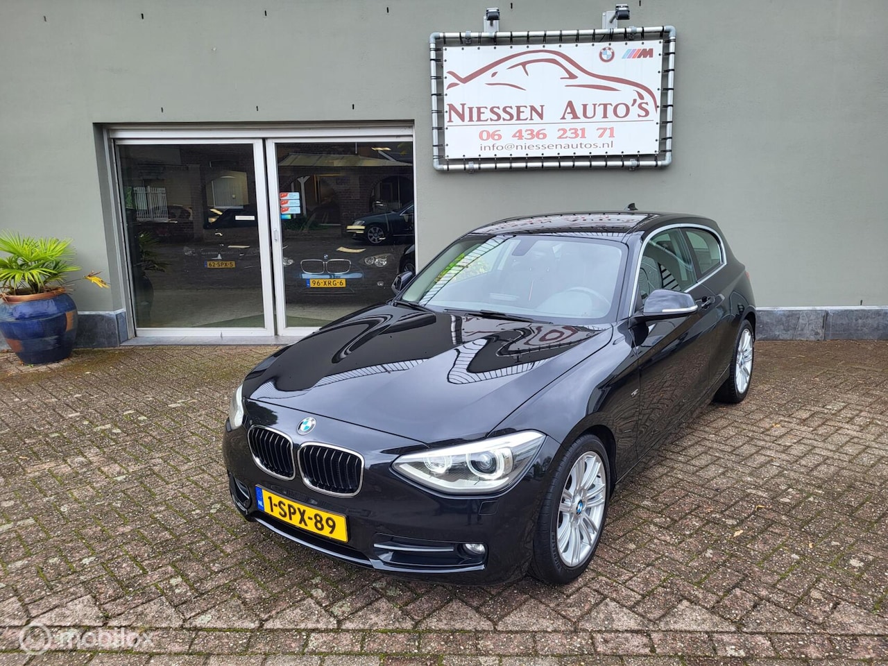 BMW 1-serie - 116i EDE Sport Navi/Xenon/Trekhaak Ketting V.V - AutoWereld.nl