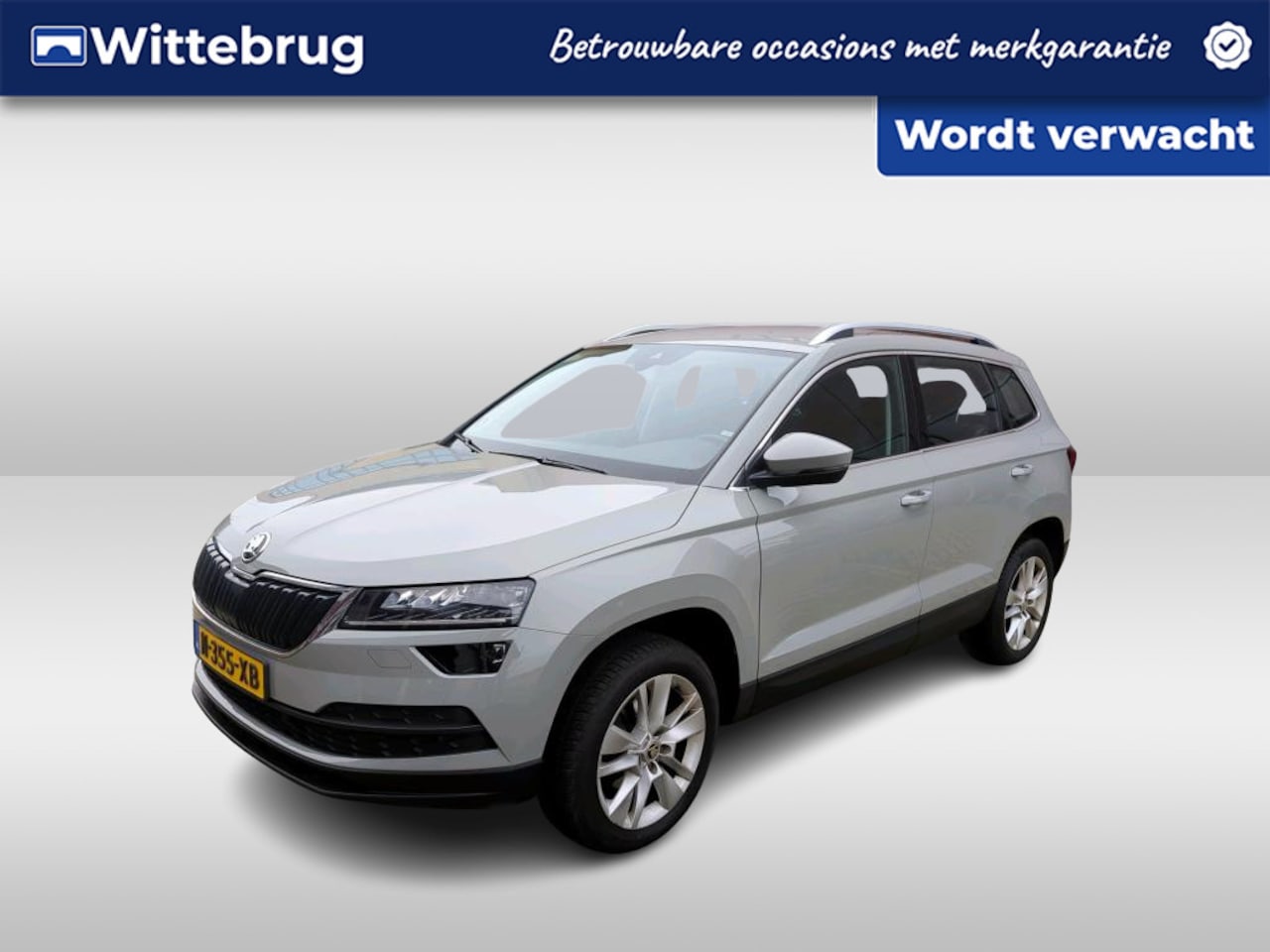 Skoda Karoq - 1.0 TSI Business Edition Plus / TREKHAAK/ CAMERA/ NAVI/ 17" LMV - AutoWereld.nl