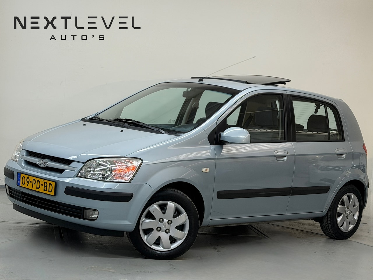 Hyundai Getz - 1.3i GLS Sky Airco APK SchuifDak - AutoWereld.nl