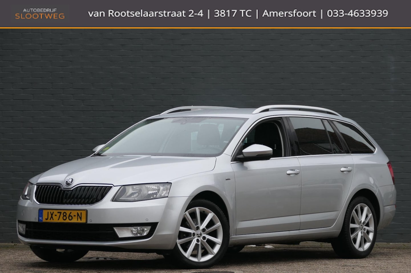 Skoda Octavia Combi - 1.6 TDI JOY Business Navi | Stoelverwarming | Trekhaak - AutoWereld.nl