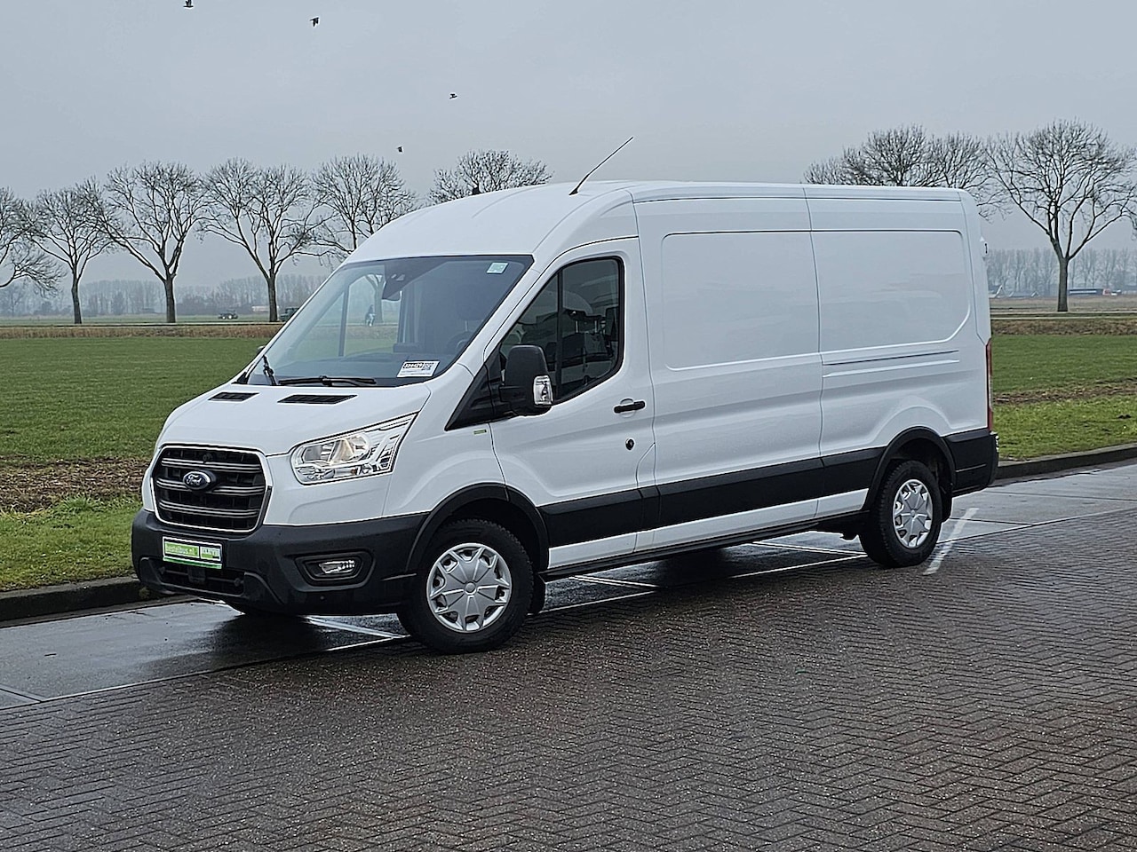 Ford Transit - 350 2.0 TDCI L3H2 airco, navi, pdc, camera, trekhaak, cruise - AutoWereld.nl