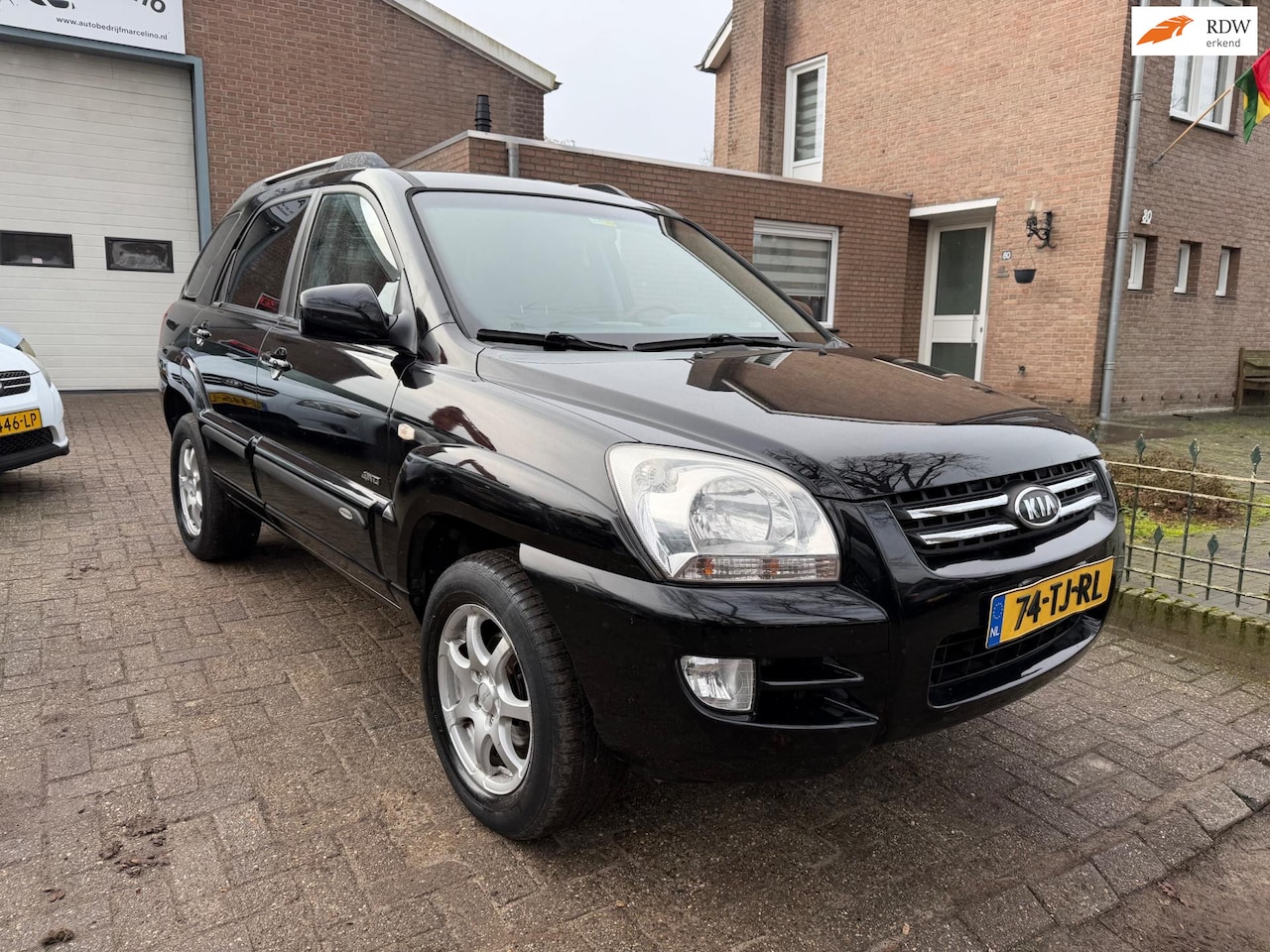 Kia Sportage - 2.7 V6 M-bition 4WD automaat - AutoWereld.nl