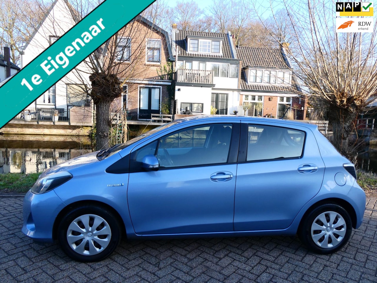 Toyota Yaris - 1.5 Full Hybrid Automaat 1e eig. Clima Cruise Camera LED - AutoWereld.nl