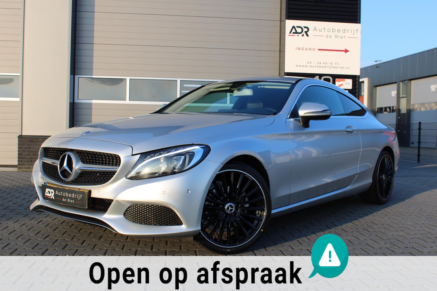 Mercedes-Benz C-klasse Coupé - 180 Prestige AMG / Full Led / 19''/ Leder / PDC V+A / volle auto - AutoWereld.nl