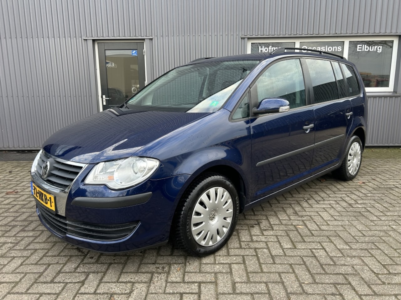 Volkswagen Touran - 1.4 TSI Trendl. 7Pers Airco NAP APK! - AutoWereld.nl