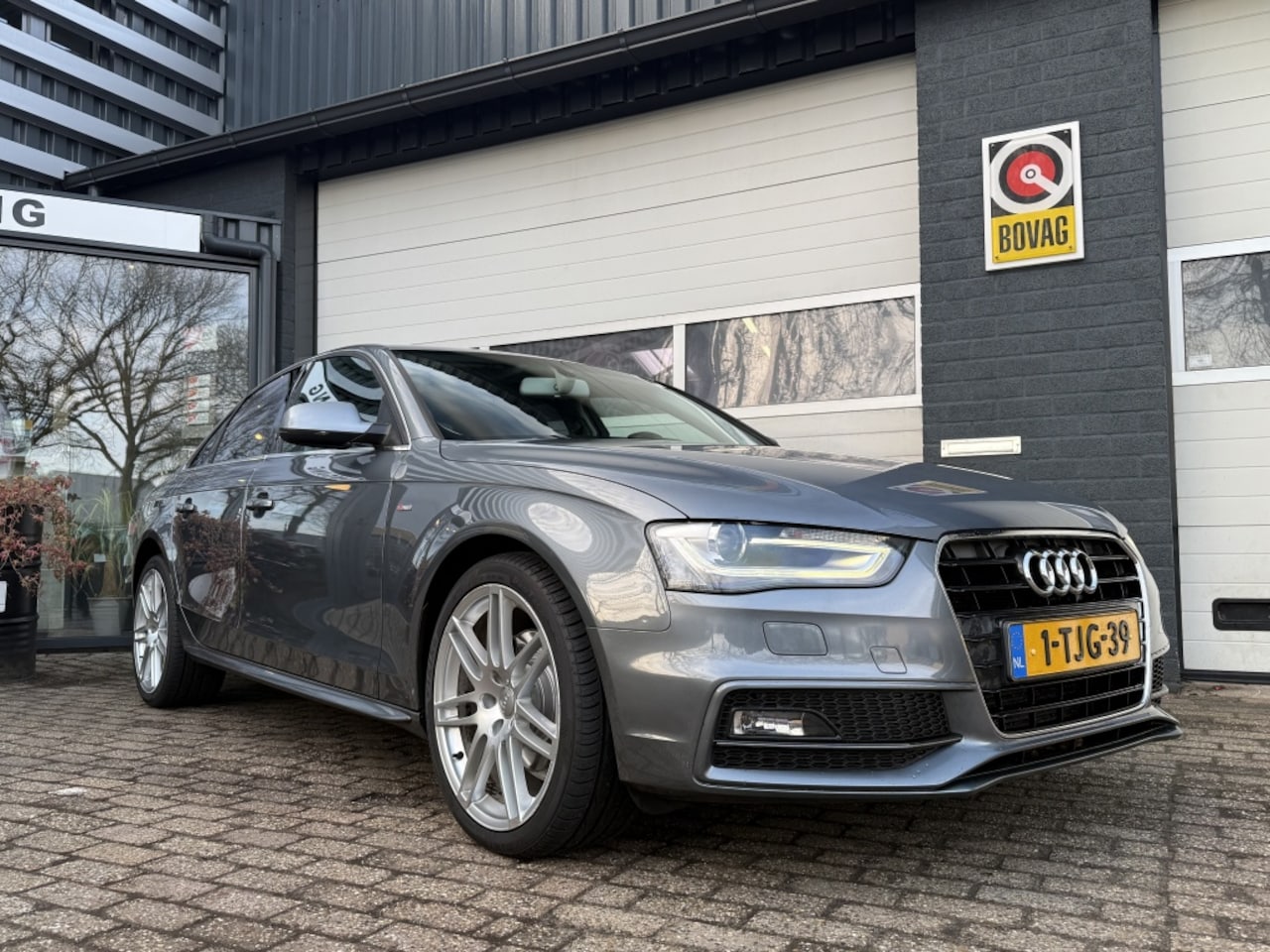 Audi A4 Limousine - 1.8 TFSI Business S-Line - AutoWereld.nl