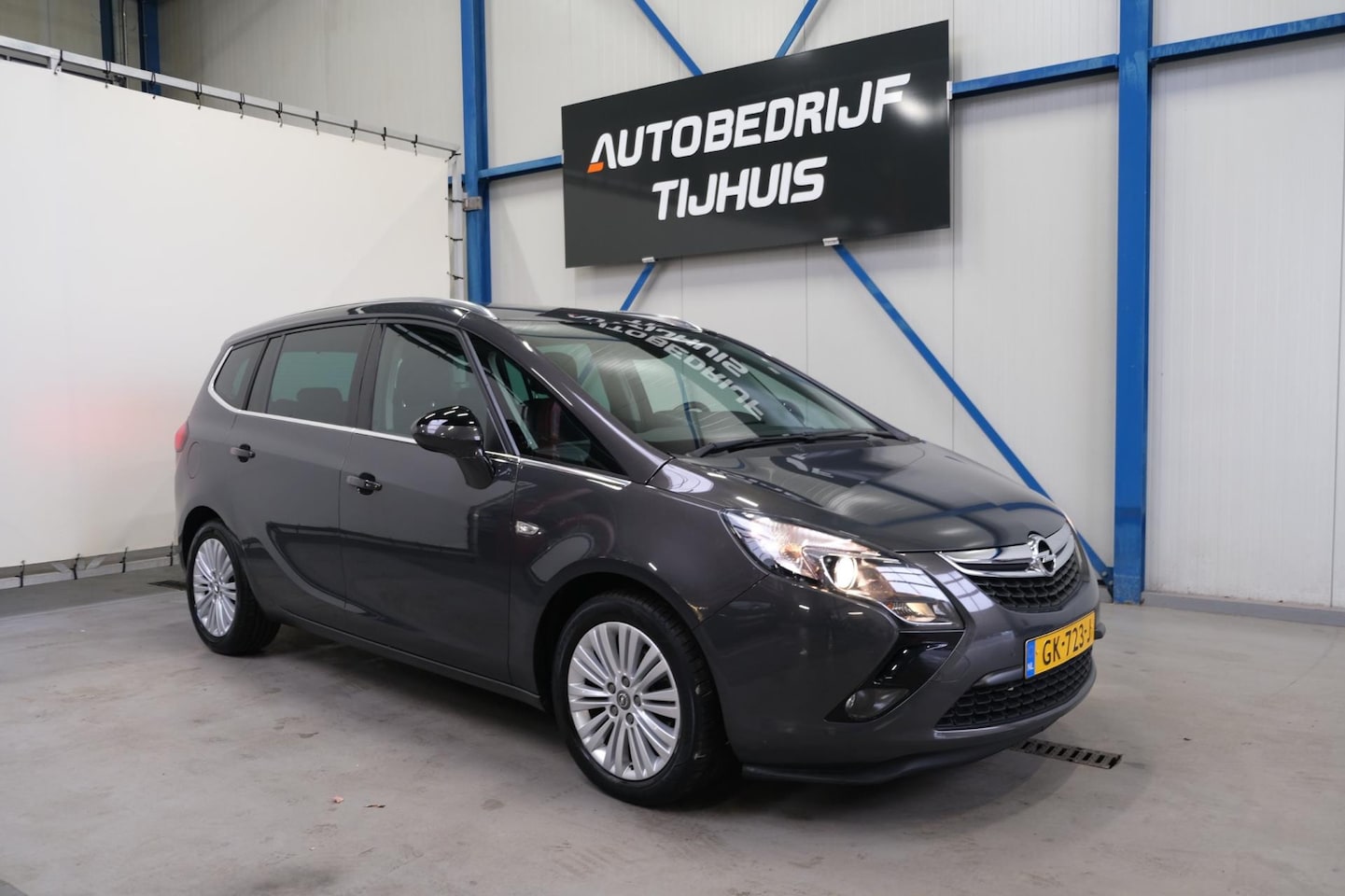 Opel Zafira Tourer - 1.4 Edition 7p - N.A.P. Airco, Cruise, Navi, Trekhaak, PDC. - AutoWereld.nl