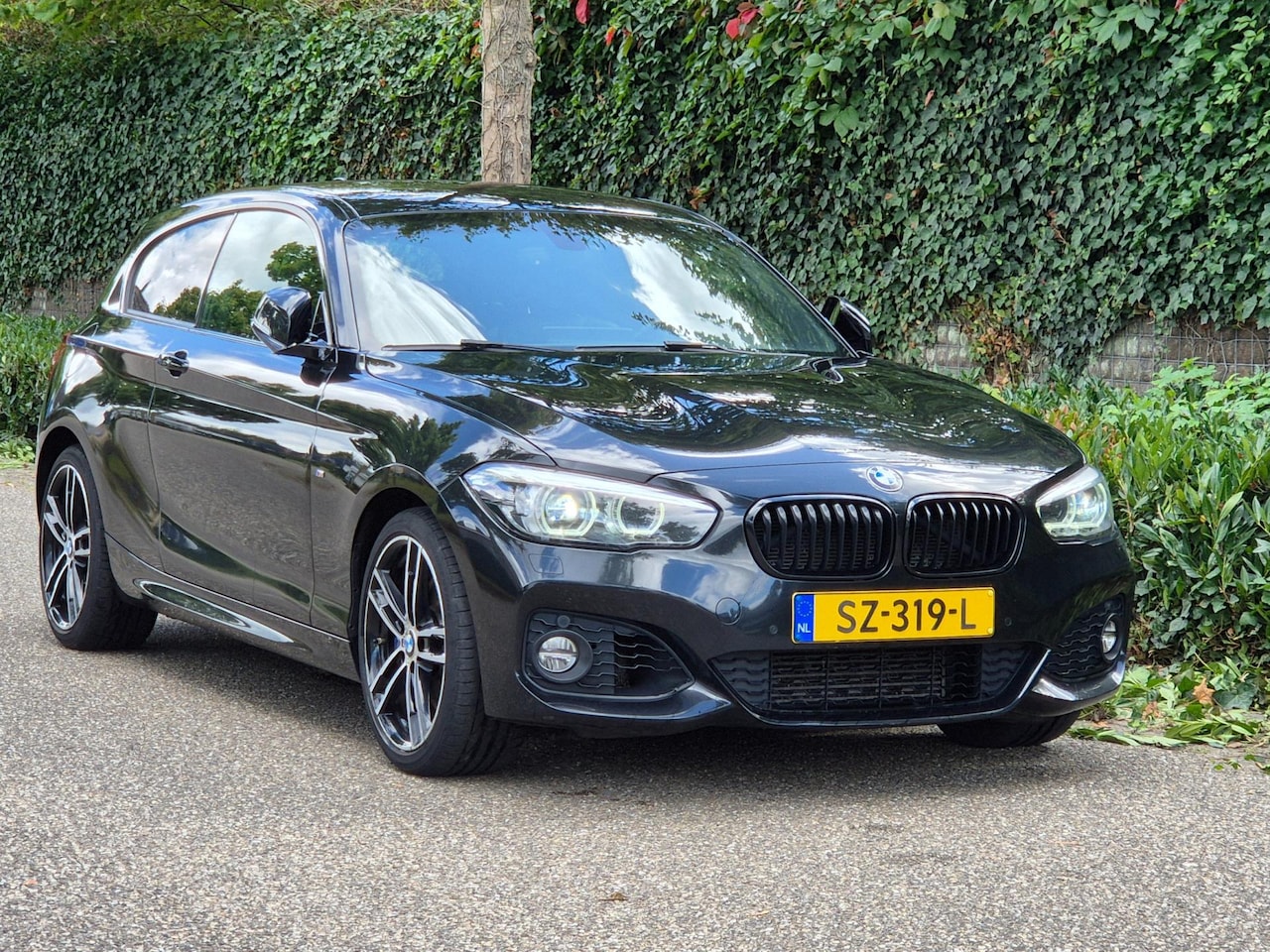 BMW 1-serie Coupé - M Sport Executive CarPlay Adaptieve LED Keyless Harman Kardon NAP Rijklaar - AutoWereld.nl