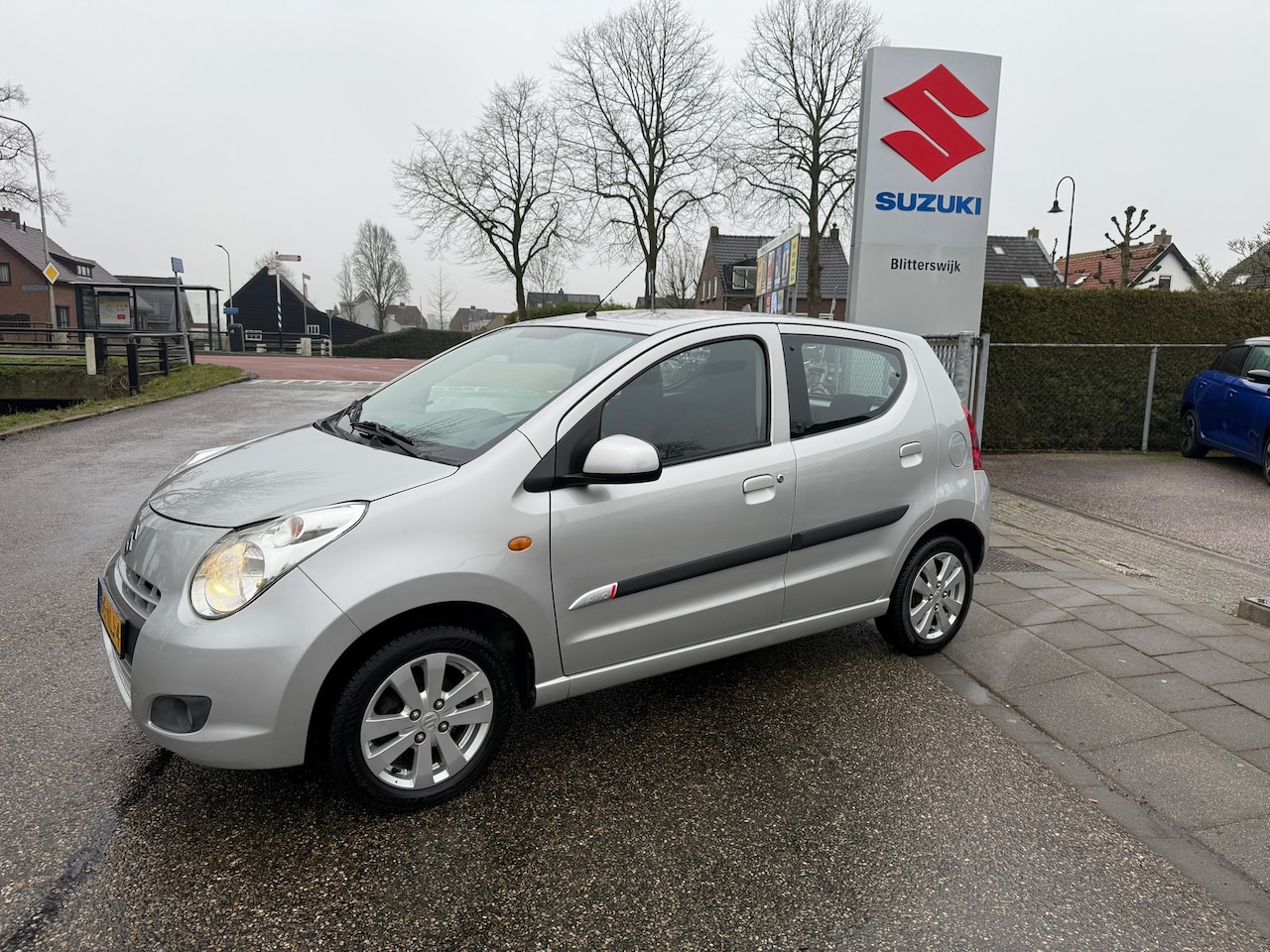 Suzuki Alto - 1.0 Exclusive AUTOMAAT // Door ons nieuw geleverd en onderhouden // Airco // Stootlijsten - AutoWereld.nl