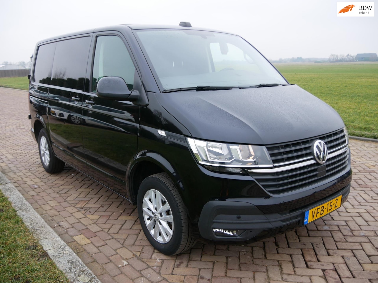 Volkswagen Transporter - 2.0 TDI L1H1 28 110kW DSG 2XDOOR AC NAVI ** 12599 EX BTW ** - AutoWereld.nl