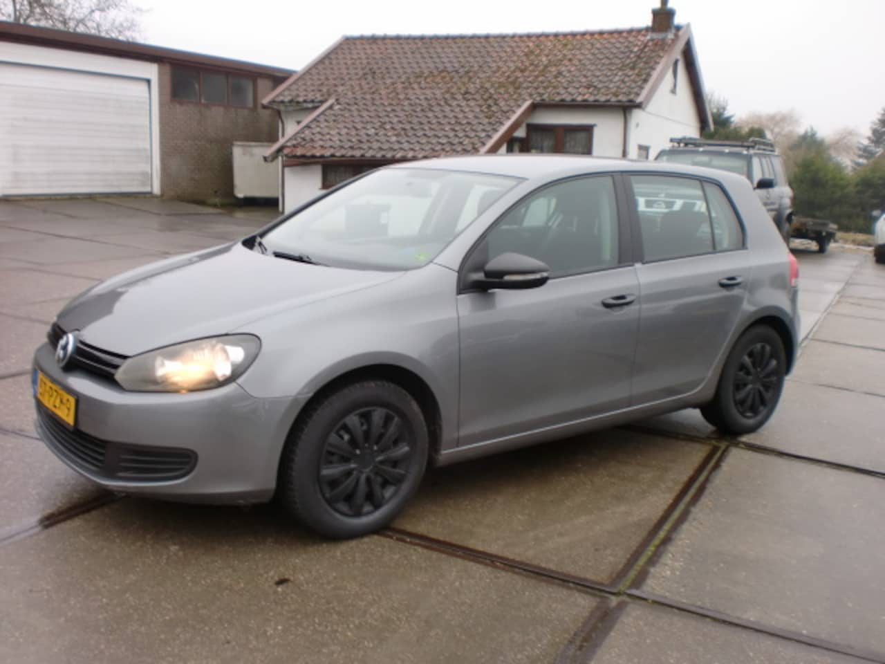 Volkswagen Golf - 1.2 TSI 63KW 5D AIRCO NAVI ABS GRIJS BJ2011 - AutoWereld.nl