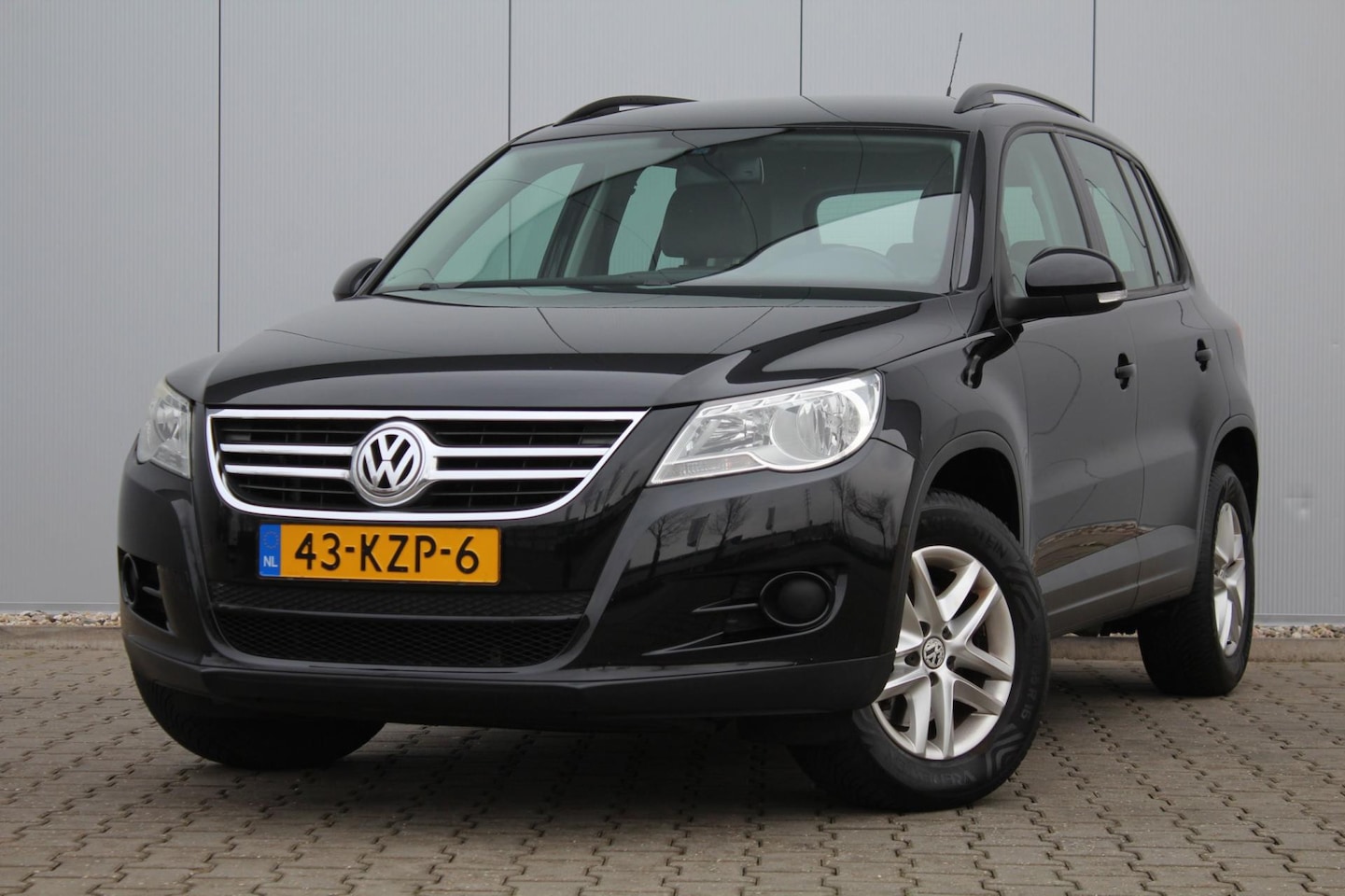 Volkswagen Tiguan - 1.4 TSI Comfort&Design | Trekhaak | Navigatie | Clima / Cruise control| NAP | APK | - AutoWereld.nl