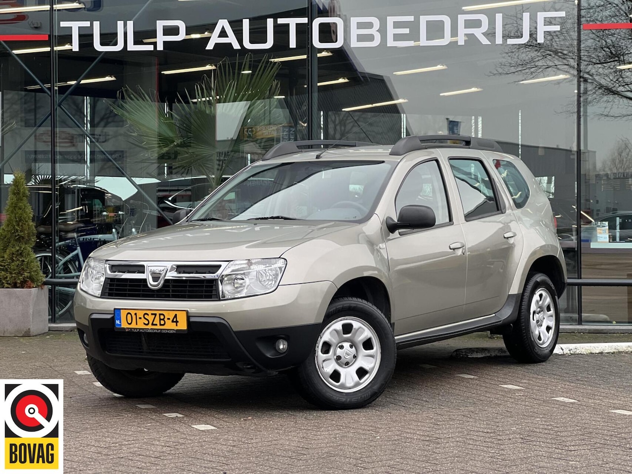 Dacia Duster - 1.6 Lauréate 2wd Airco Cruise control Trekhaak - AutoWereld.nl