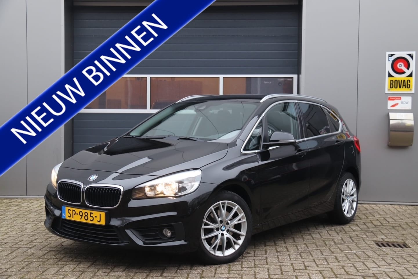 BMW 2-serie Active Tourer - 218i Luxury 218i Luxury, Stoelverwarming, Trekhaak, Parkeerhulp, Navi - AutoWereld.nl