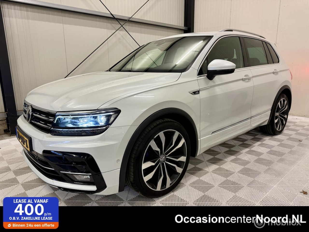 Volkswagen Tiguan - 1.4 TSI 4Motion Highline 3x R-line - AutoWereld.nl